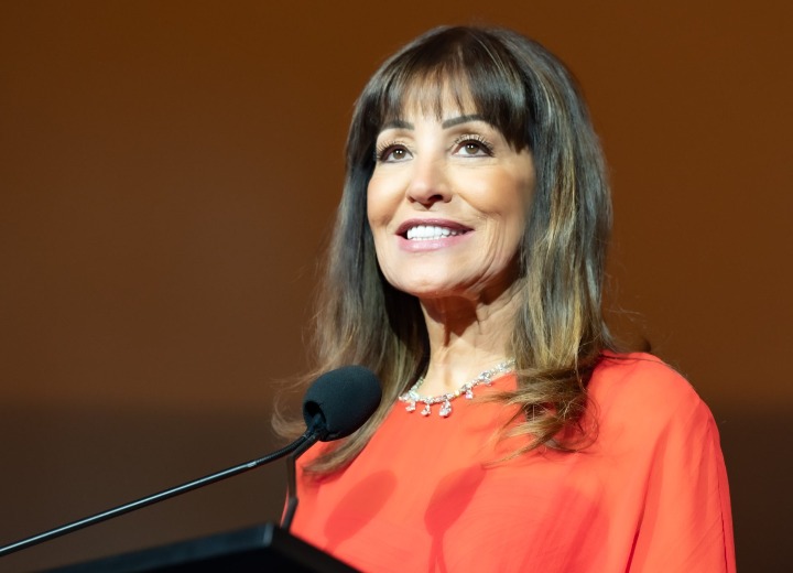 some women carry light. eleni bousis becomes it. not all angels have wings — some have work to do.
